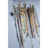 COLLECTION OF OLD AND VERY OLD VARIOUS FISHING RODS INCLUDING BAMBOO, HICKORY WOOD, SPLIT CANE AND F