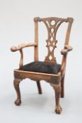 A GEORGE III IRISH MAHOGANY CARVER CHAIR