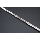 A 9CT WHITE GOLD AND DIAMOND BRACELET