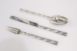 AN EDWARDIAN SILVER THREE PIECE CHRISTENING SET WITH "BAMBOO" HANDLES, WILLIAM HUTTON & SONS LTD., S