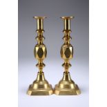 A PAIR OF VICTORIAN ACE OF DIAMONDS BRASS CANDLESTICKS