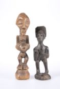 TRIBAL: TWO CARVED FIGURES. Taller 20.5cm