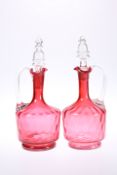 A PAIR OF CRANBERRY GLASS DECANTERS, LATE 19th CENTURY