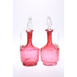 A PAIR OF CRANBERRY GLASS DECANTERS, LATE 19th CENTURY
