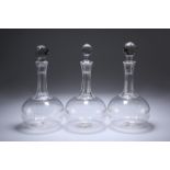 A SET OF THREE VICTORIAN GLOBE DECANTERS