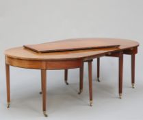 A GEORGE III MAHOGANY D-END DINING TABLE