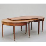 A GEORGE III MAHOGANY D-END DINING TABLE