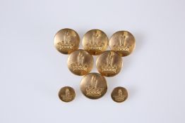 A SET OF BRASS LIVERY BUTTONS, (6+2).