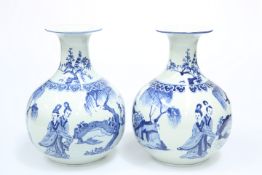 A LARGE PAIR OF CHINESE BLUE AND WHITE VASES