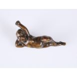 A BRONZE OF A WAKING PUTTO, possibly 18th Century. 7.5cm