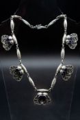 AN EARLY GEORG JENSEN SILVER NECKLACE