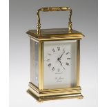 A 20TH CENTURY BRASS CASED CARRIAGE CLOCK