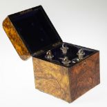 A 19TH CENTURY BURR WALNUT DECANTER BOX