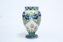 WILLIAM MOORCROFT FOR JAMES MACINTYRE & CO, A "ROSE AND TULIP" PATTERN VASE