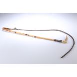 A BRIGG SILVER-COLLARED BAMBOO RIDING CROP, LONDON 1897