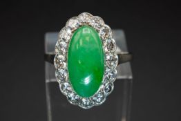 A JADE AND DIAMOND RING