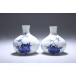 A PAIR OF SMALL CHINESE BLUE AND WHITE PORCELAIN VASES