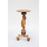 AN ITALIAN CARVED PINE FIGURAL TABLE,