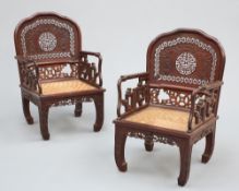 A PAIR OF CHINESE HARDWOOD ARMCHAIRS