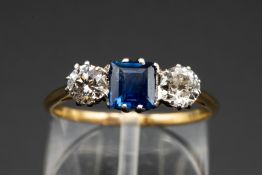 A SAPPHIRE AND DIAMOND RING