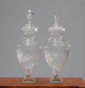 A LARGE PAIR OF ADAM STYLE GLASS URNS AND COVERS