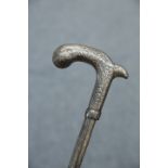 AN INDIAN SILVER INLAID AND NIELLO DECORATED WALKING STICK