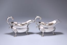 A PAIR OF GEORGE III SILVER SAUCE BOATS, LONDON 1773