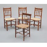 THREE RUSH-SEATED OAK CHAIRS AND SIMULATED ROSEWOOD CHAIR