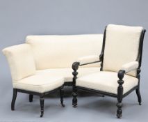 A VICTORIAN EBONISED AND UPHOLSTERED PARLOUR SUITE