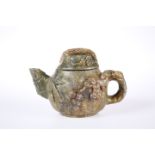 A CHINESE CARVED HARDSTONE TEAPOT