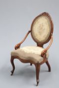 A VICTORIAN WALNUT AND UPHOLSTERED PANEL-BACK DRAWING ROOM CHAIR