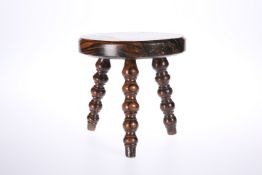 A 19th CENTURY GRAIN-PAINTED TREEN CANDLE STAND