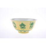 A CHINESE YELLOW GROUND AND GREEN DECORATED BOWL