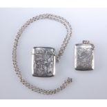 TWO EDWARDIAN SILVER VESTA CASES