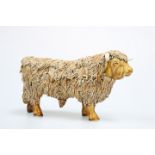 A POTTERY MODEL OF A HIGHLAND BULL, signed Craig Gilchrist
