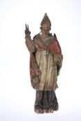 A CONTINENTAL CARVED POLYCHROME WOODEN FIGURE OF A BISHOP, PROBABLY 18th CENTURY