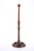 A GEORGIAN MAHOGANY WIG STAND, of typical form with dished circular base