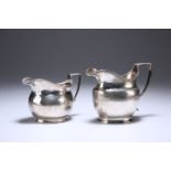 TWO GEORGIAN SILVER CREAM JUGS