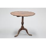 A CHIPPENDALE STYLE MAHOGANY TILT-TOP TRIPOD TABLE