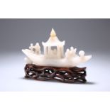AN EARLY 20TH CENTURY CHINESE JADE MODEL OF A RIVER BOAT