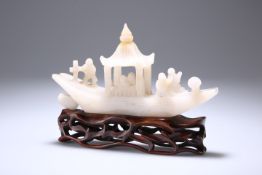 AN EARLY 20TH CENTURY CHINESE JADE MODEL OF A RIVER BOAT