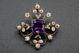 AN AMETHYST AND DIAMOND BROOCH