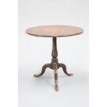 AN 18TH CENTURY OAK TILT-TOP TRIPOD TABLE