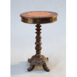 AN ANGLO-INDIAN CARVED HARDWOOD TILT-TOP OCCASIONAL TABLE