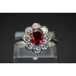 A THAI RUBY AND DIAMOND CLUSTER RING