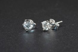 A PAIR OF 18CT WHITE GOLD DIAMOND STUD EARRINGS