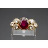 AN 18CT YELLOW GOLD RUBY AND DIAMOND COCKTAIL RING