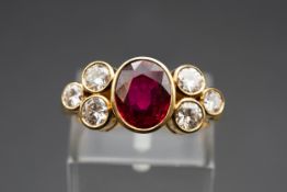 AN 18CT YELLOW GOLD RUBY AND DIAMOND COCKTAIL RING