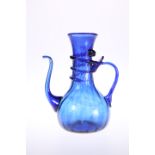 A BLUE GLASS EWER, PROBABLY VENETIAN, 19TH CENTURY