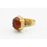 A GEORGIAN CARNELIAN INTAGLIO RING